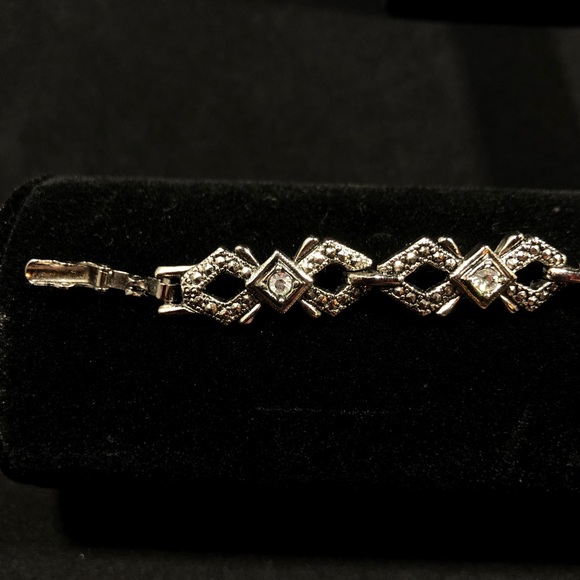 BRACELET - SILVER-TONE WITH 7 RHINESTONES EACH SET IN A SQUARE SETTING - Picture 6 of 16